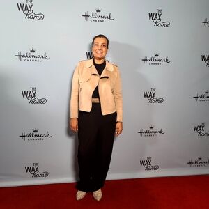 Tan Jacket with Black Outfit